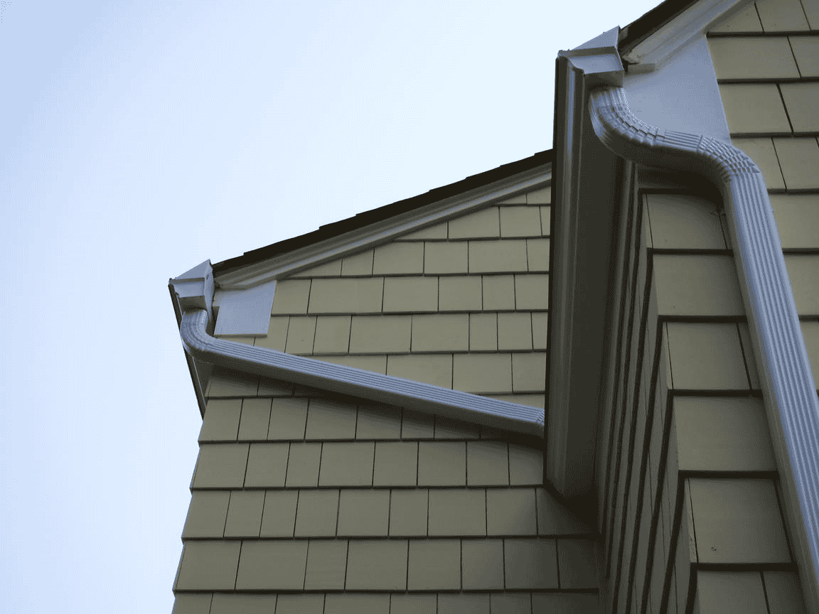 White Gutter Installation Seattle Tie In To Lower Gutter With Leaflessgutter™ Protection